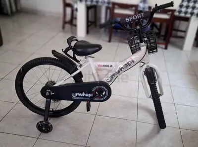 Muhapi Kids Bicycle with Training Wheels  Front Basket - AED 200 (Dubai). Age 6-9yrs, selling urgen