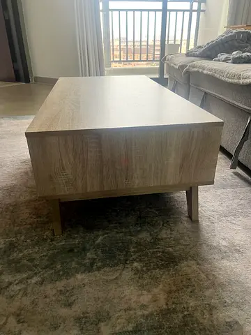 Coffee table with draw