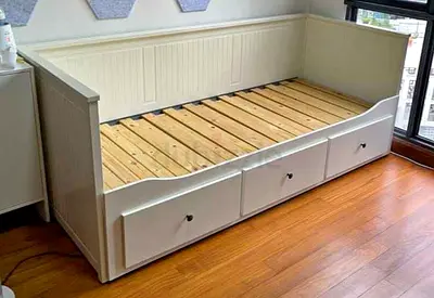 IKEA hamnes day bed with 3 big storage drawers underneath and with 2 IKEA mattresses is available