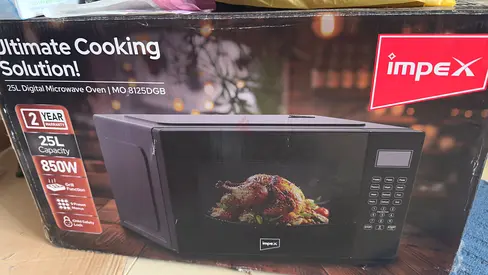 Impex Microwave:25 Ltr, 1 year Old. 850W Under Warranty with manual  original Box
