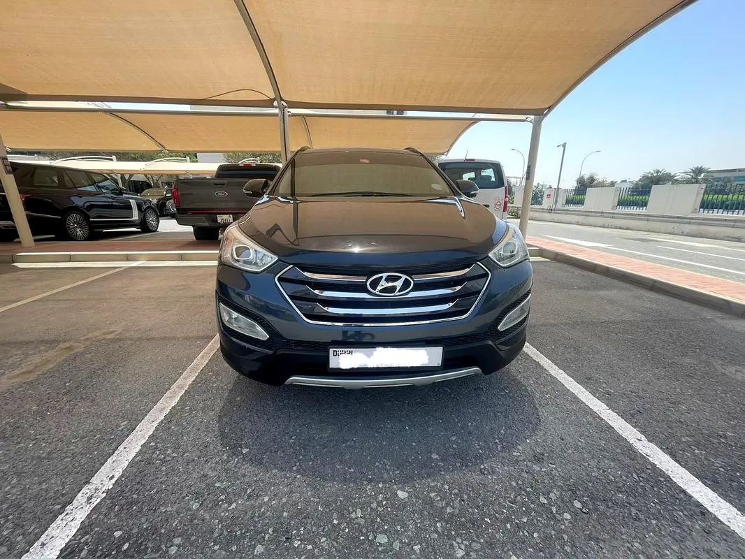 Hyundai Santa Fe 2016 — photo 1 of 8