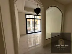 For annual rent, first occupancy. Two-bedroom apartment with living room, Al-Talla 2 area.