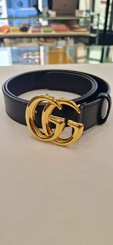 Black leather belt with gold double-G style buckle - like new