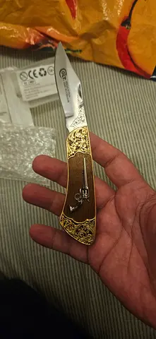 Vintage-style Colt Pocket Knife with Decorative Brass Inlay