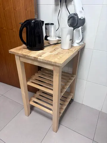 Small wooden kitchen trolley with two slatted shelves — good condition