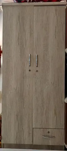 Two-door wooden wardrobe with bottom drawer - light oak finish