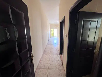 Studio apartment with balcony, staff quarters, separate kitchen, spacious, split AC, and a prime location.