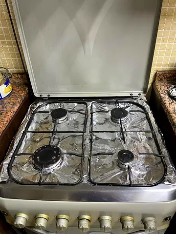 Used 4-Burner Gas Stove with Oven - Good Working Condition with food steamer for FREE