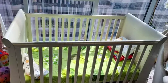 White Wooden Baby Crib in Good Condition