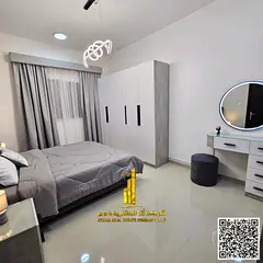 Luxury apartment, first occupancy, one bedroom and living room with a balcony and open view. Ajman,