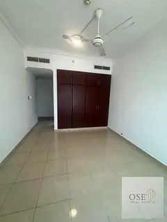 Two bedrooms and a living room in Conqueror Tower Cash, with a large area