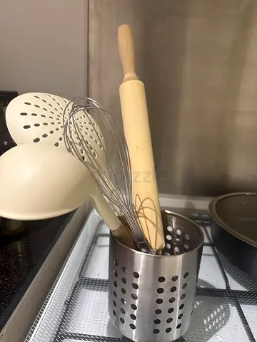 Kitchen utensils set: whisk, rolling pin, ladle — light use