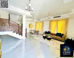 Luxury classic villa for sale in Al Helio area - Ajman | High-end finishes