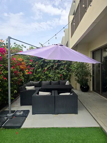 Outdoor rattan patio sofa set with cantilever umbrella — good condition
