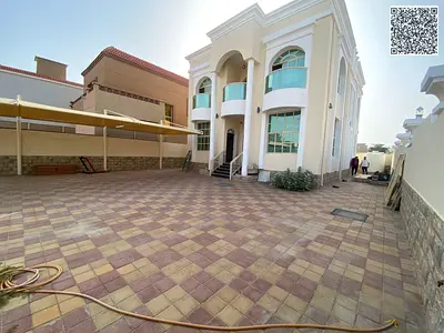 Luxury corner villa on two streets, 9 years old, featuring 5 master bedrooms, a spacious majlis, comfortable family living hall, fully equipped kitche