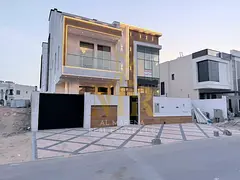 Luxury villa in the heart of Ajman, two floors and a roof, price includes registration and ownership