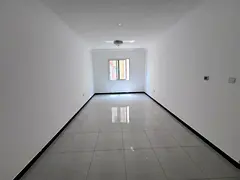A two-bedroom apartment with a living room is available for annual rent in Al Muwaihat 3, Ajman. Loc