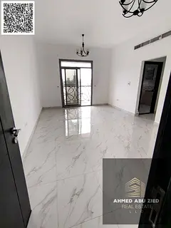 Luxurious 2BR apartment, living room, 3 baths, wardrobes, central AC, balcony, open view, prime loca