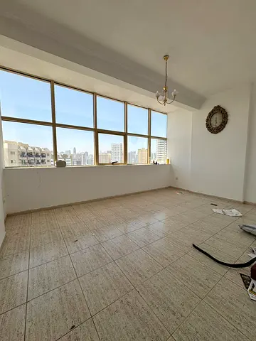 One-bedroom apartment for annual rent | Spacious living room | Large kitchen | Bathroom | Free air conditioning | Open view | Prime location .