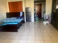 Fully furnished large studio in International City. AED 1,250 month per person (2 persons sharing)