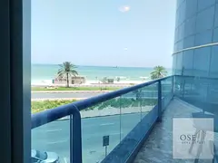 One bedroom and living room with a sea view overlooking Ajman Corniche