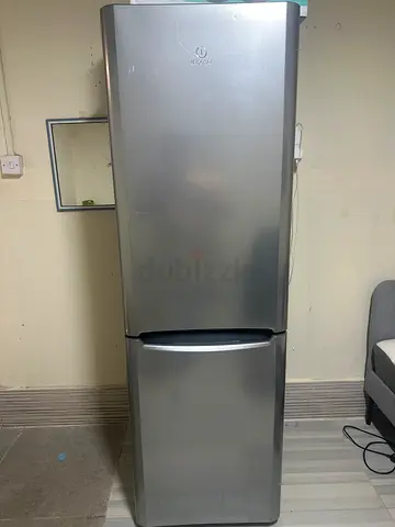 Silver double-door refrigerator with bottom freezer - good condition