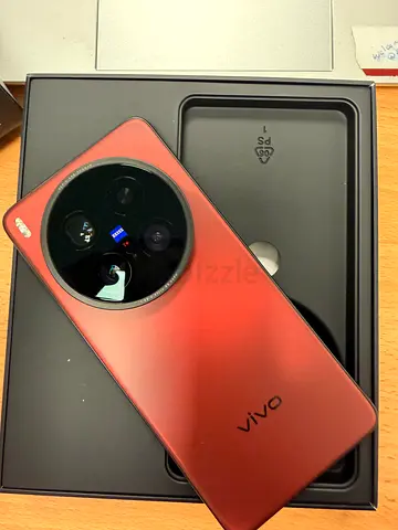 Vivo smartphone (red) in box — good condition