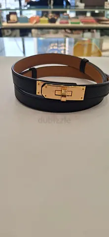 Black leather belt with gold-tone buckle — gently used