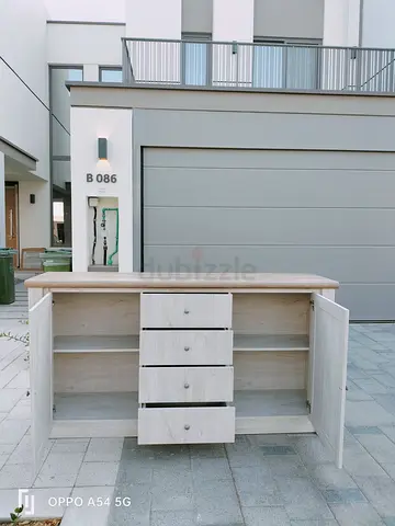 Light Wood Sideboard Cabinet with Drawers and Shelves.