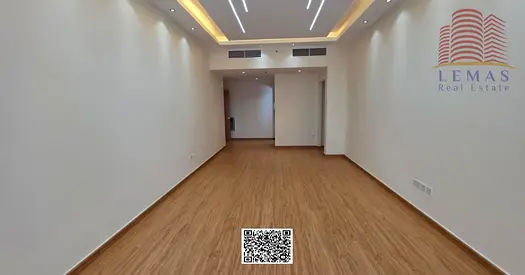 One bedroom and living room with a garden view and a closed kitchen.