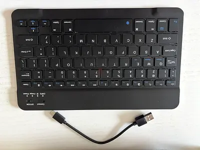Compact USB Rechargeable Bluetooth Keyboard — Slim, Portable