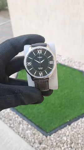 Timex Indiglo WR 50M Green Dial Brown Leather Band, issued by Timex. There’S Roman Numeral Hour Mark