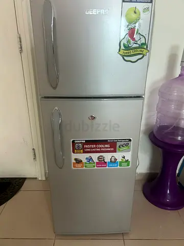 Silver Double-Door Refrigerator - Urgent Sale in MANKHOOL Burdubai available
