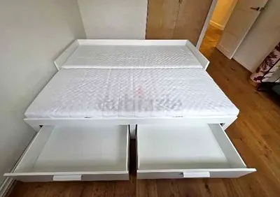l brimness  Day bed with 2 storage drawers underneath and with 2 IKEA mattresses