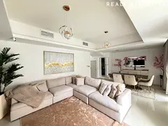 Elegant 3BR + Maid Townhouse with Upgrades, Chandeliers &amp; Private Garden Feature-Rich