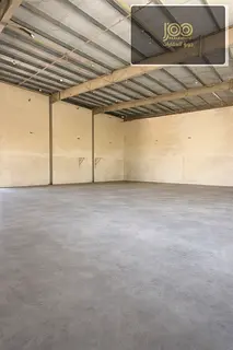 8000 sqft warehouse UAQ mezzanine 100KW AED 310K two main roads offices ready