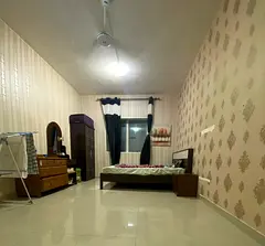 Fully Furnished room with dedicated washroom for Family or Executive females in Al Majaz-2 ,kasba