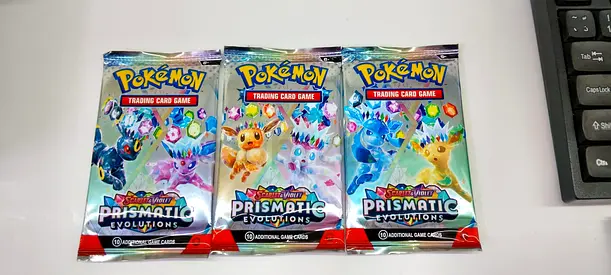 Three Sealed Pokémon TCG Prismatics Evolutions Booster Packs