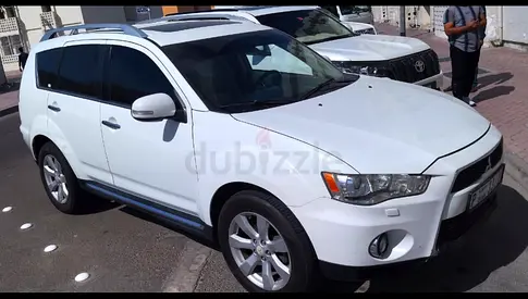 Mitsubishi Outlander Only AED 12000 using since 2017