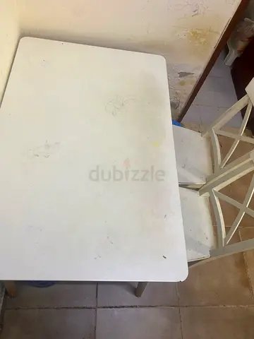 Used small white dining table — compact, plain top