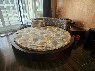 Round Wooden Bed with Cushioned Headboard — Excellent Condition FOR SALE