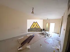 Two-Bedroom Apartment for Annual Rent in Al Rashidiya 3, Next to the Park