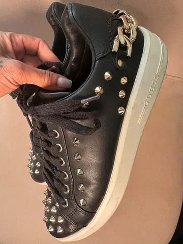 Black studded low-top sneakers with chain detail - GUESS
