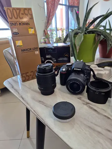 Nikon D3300 DSLR with 18-55mm and 55-200mm Lenses + Accessories