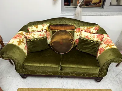 2-Seater Olive Green Velvet Sofa with Floral Accents from Homes R Us
