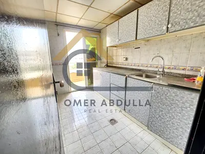 1BHK Apartment with Balcony | Prime Location | Family-Friendly | Muwaileh