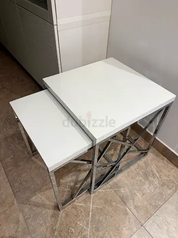 White nesting side tables with chrome legs