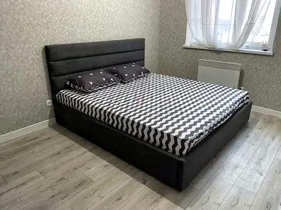 Upholstered platform bed with storage, dark grey
