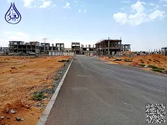Townhouse land inclusive of fees at a bargain price in Al Helio 2.