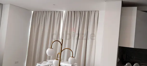 Beige floor-to-ceiling curtains — like new, full coverage